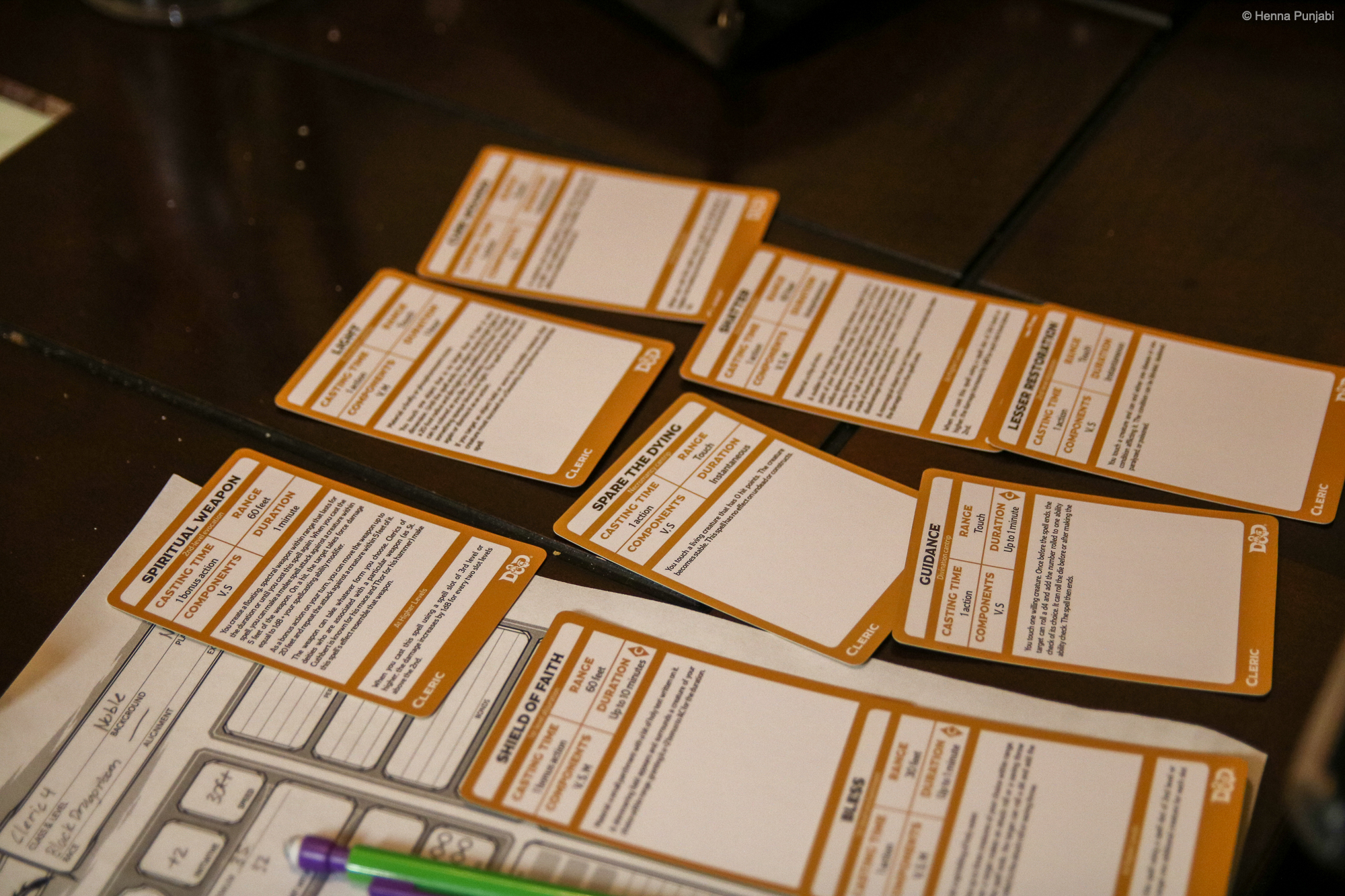 cleric spell cards laid out on a table